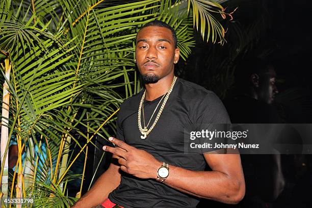 Player John Wall visits the Empire Hotel Rooftop on August 7, 2014 in New York City.