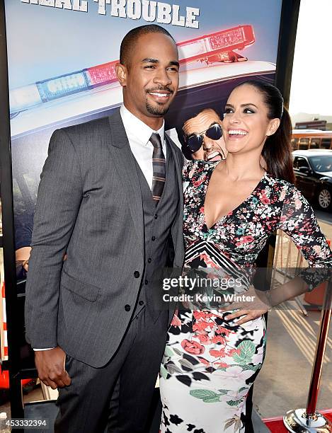 Actor Damon Wayans Jr. And Samara Saraiva arrive at the premiere of Twentieth Century Fox's "Let's Be Cops" at the Cinerama Dome on August 7, 2014 in...