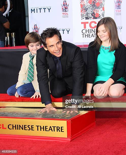 Ben Stiller, Christine Taylor, Quinlin Stiller and Ella Stiller pose as he is honored with a hand and footprint ceremony at TCL Chinese Theatre on...