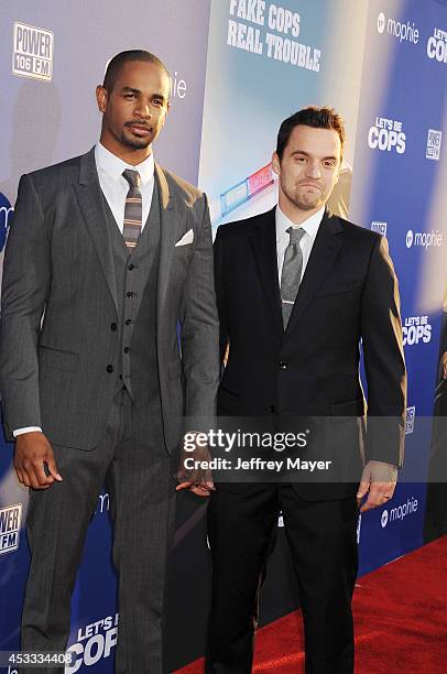 Actors Damon Wayans, Jr. And Jake Johnson attend the 'Let's Be Cops' Los Angeles Premiere held at the ArcLight Hollywood on August 7, 2014 in...