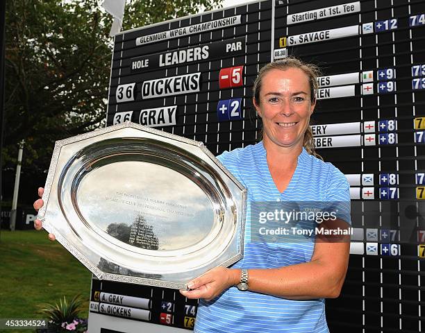 Suzanne Dickens of Thorpe Wood Golf Course poses with the trophy after winning the Glenmuir Women's PGA Professional Championship during day two of...