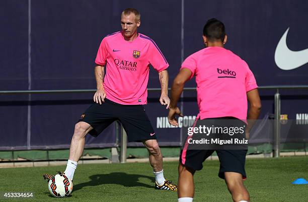 Jeremy Mathieu of Barcelona in action during training at the Ciutat Esportiva Joan Gamper training ground on August 7, 2014 in Barcelona,Spain.