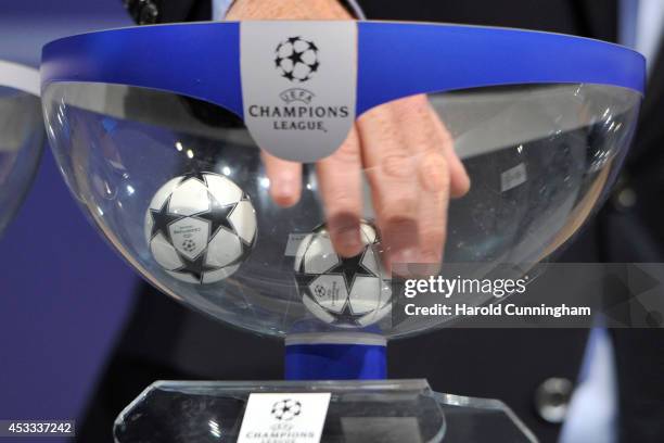 Draw balls are shuffled during the 2014/15 UEFA Champions League Play-off round draw at the UEFA headquarters, The House of European Football on...