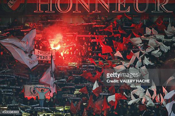 Nice supporters react during the French L1 football match between Nice and Monaco on December 3 at the Allianz Riviera stadium in Nice, southeastern...