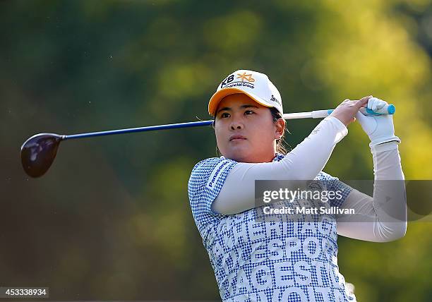 Inbee Park watches her tee shot on the 11th hole during the second round of the Meijer LPGA Classic at Blythefield Country Club on August 8, 2014 in...