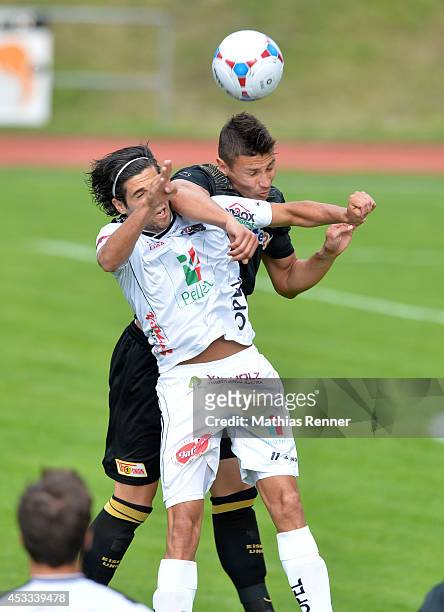Jacobo Maria Ynclan Pajares and Damir Kreilach go up for a header during the test match between 1 FC Union Berlin and Wolfsberger AC on july 5, 2014...