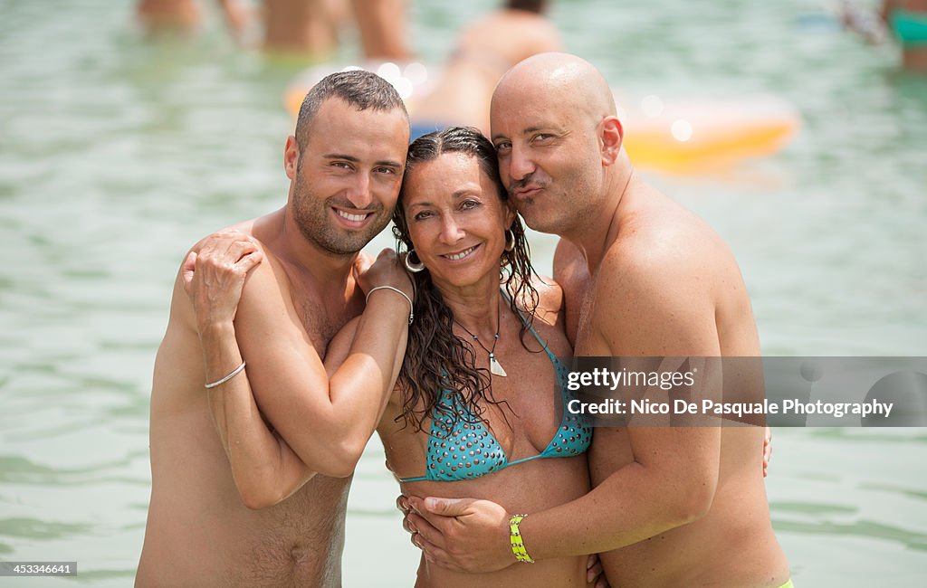 Smiling friends at sea