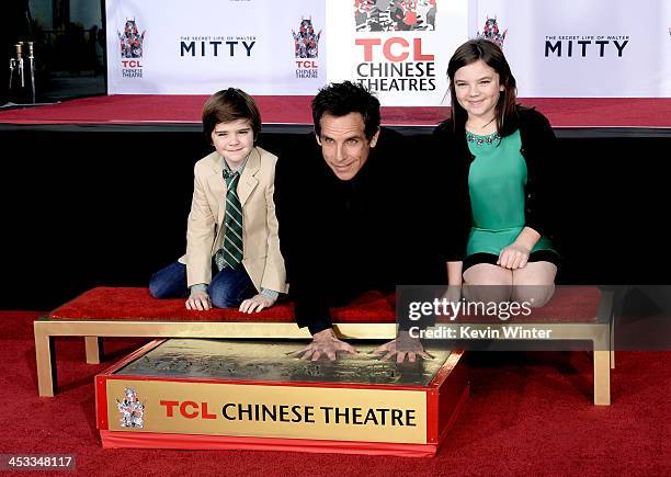 Actor Ben Stiller and his children Quinlin Stiller and Ella Stiller pose as he is honored with a hand and footprint ceremony at the TCL Chinese...