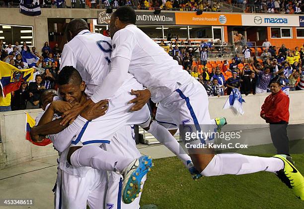 Carlo Costly of Honduras reacts after scoring his second goal against Ecuador with Wilson Palacios, Maynor Figueroa, Jerry Palacios and Víctor...