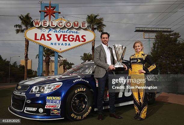 Sprint Cup Champion Jimmie Johnson, driver of the Lowe's Chevrolet and Miss Sprint Cup Brooke Werner pose for a photo at the 'Welcome to Fabulous Las...