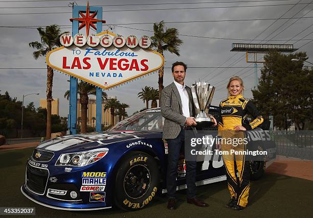 Sprint Cup Champion Jimmie Johnson, driver of the Lowe's Chevrolet and Miss Sprint Cup Brooke Werner pose for a photo at the 'Welcome to Fabulous Las...