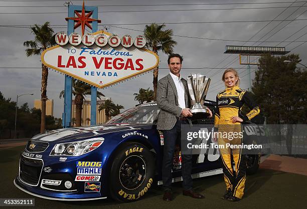 Sprint Cup Champion Jimmie Johnson, driver of the Lowe's Chevrolet and Miss Sprint Cup Brooke Werner pose for a photo at the 'Welcome to Fabulous Las...