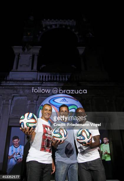 Cafu, Hernane and Seedorf pose with the World Cup Brazuca ball during the adidas Brazuca launch at Parque Lage on December 3, 2013 in Rio de Janeiro,...