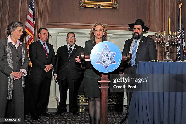 United States Representative Debbie Wasserman Schultz , Chairman of the Democratic National Committee, makes remarks before a Chanukah Menorah is lit...