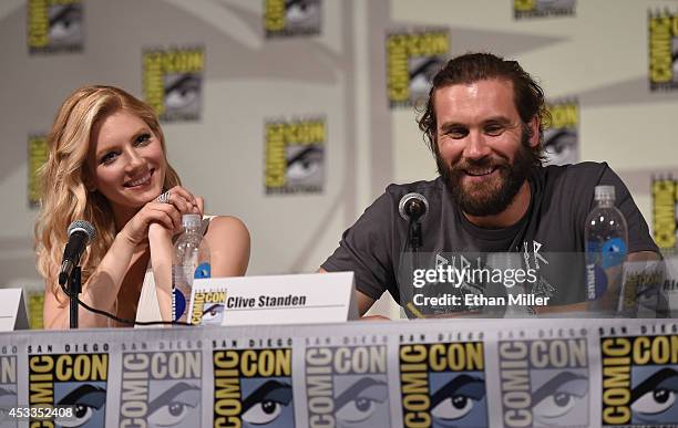 Actress Katheryn Winnick and actor Clive Standen attend a panel for the History series "Vikings" during Comic-Con International 2014 at the San Diego...