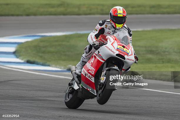 Yonny Hernandez of Colombia and Pramac Racing lifts the front wheel during the MotoGp Red Bull U.S. Indianapolis Grand Prix - Free Practice at...