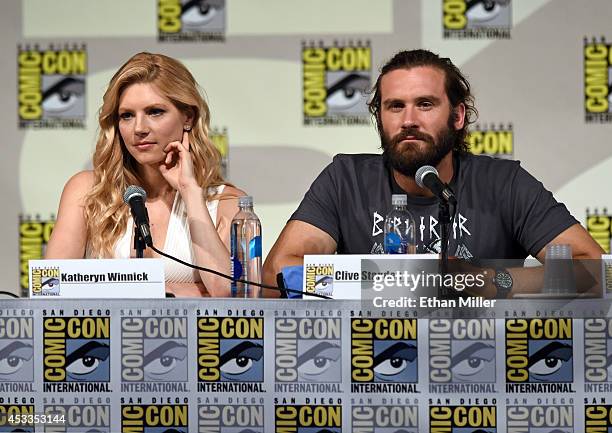 Actress Katheryn Winnick and actor Clive Standen attend a panel for the History series "Vikings" during Comic-Con International 2014 at the San Diego...