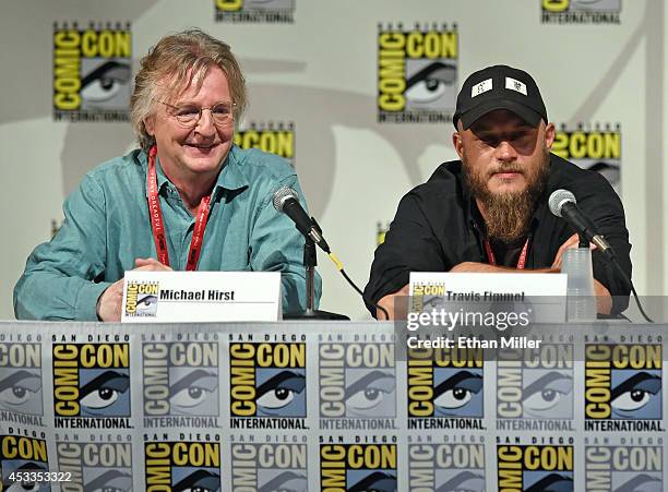 Writer/producer Michael Hirst and actor Travis Fimmel attend a panel for the History series "Vikings" during Comic-Con International 2014 at the San...