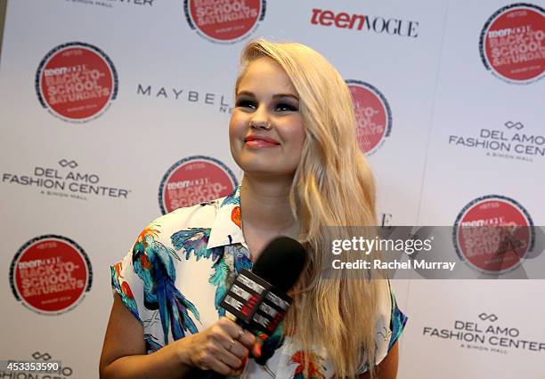 Host Debby Ryan attends Teen Vogue's Back To School Saturdays Kick-Off at Del Amo Fashion Center on August 8, 2014 in Torrance, California.