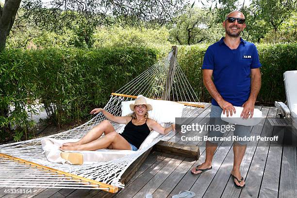 Humorist Christelle Chollet and her husband, producer and scenarist Remy Caccia attend the lunch at Jacqueline Franjou's house, as part of the 30th...