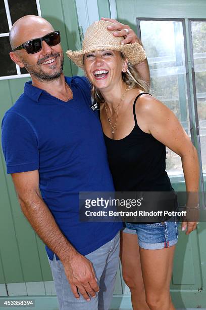 Humorist Christelle Chollet and her husband, producer and scenarist Remy Caccia attend the lunch at Jacqueline Franjou's house, as part of the 30th...