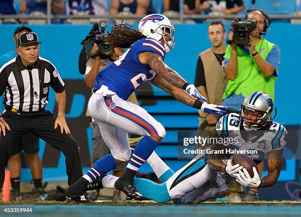 Kelvin Benjamin of the Carolina Panthers makes a touchdown catch as Stephon Gilmore of the Buffalo Bills defends during their game at Bank of America...
