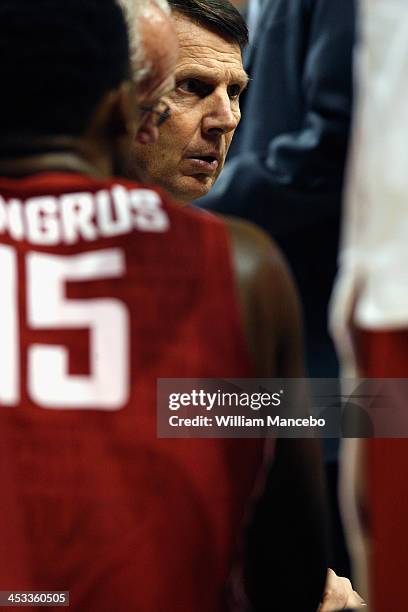 Head coach Ken Bone of the Washington State Cougars directs his players during a timeout in the game against the Gonzaga Bulldogs at McCarthey...