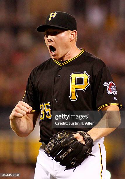 Mark Melancon of the Pittsburgh Pirates reacts after after defeating the San Diego Padres 2-1 at PNC Park on August 8, 2014 in Pittsburgh,...