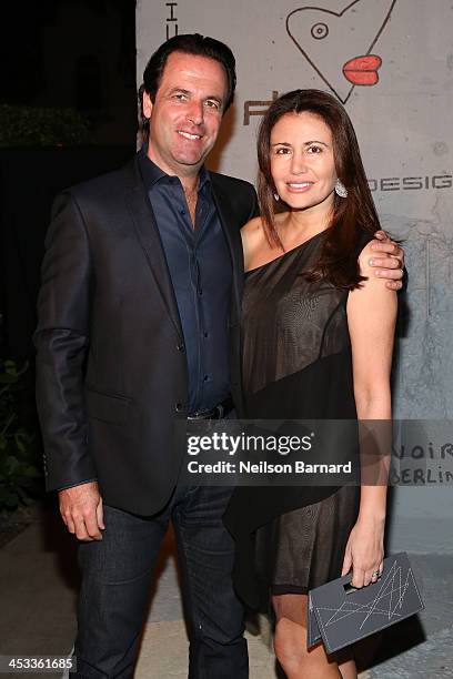 Florian Haffa and Jeanine Haffa attend the Porsche Design x Thierry Noir Art Basel Miami Beach Event at The Temple House on December 3, 2013 in Miami...