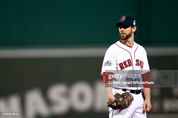Craig Breslow of the Boston Red Sox pitches in the seventh inning against the St. Louis Cardinals during Game Two of the 2013 World Series at Fenway...