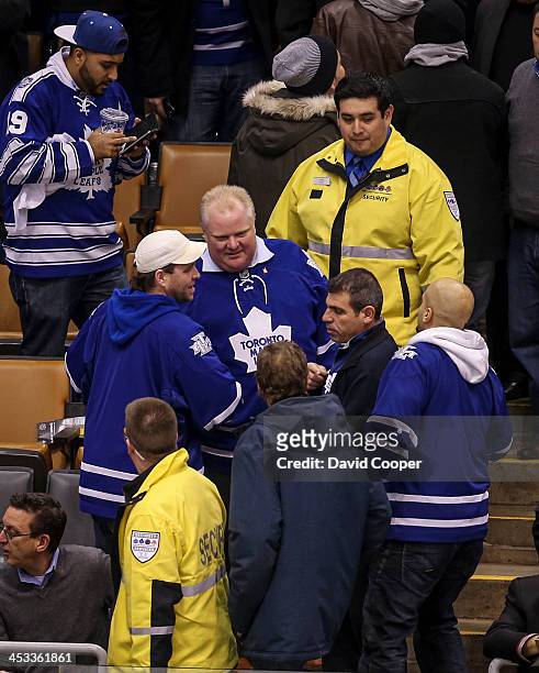 Mayor Rob Ford leaves his seat behind the San Jose Sharks bench with a few minutes to go in the 3rd period as the Toronto Maple Leafs take on the San...