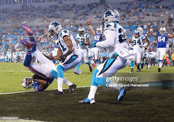 Chris Summers of the Buffalo Bills scores the game-winning touchdown against James Dockery of the Carolina Panthers during the fourth quarter of...