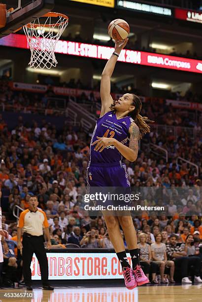 Western Conference All-Star Brittney Griner of the Phoenix Mercury attempts a slam dunk against the Eastern Conference during the first half of the...