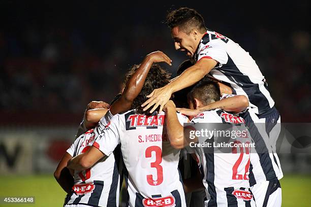 Players of Monterrey celebrate the first goal of the game during the match between Tiburones Rojos and Rayados de Monterrey as part of 4th round...