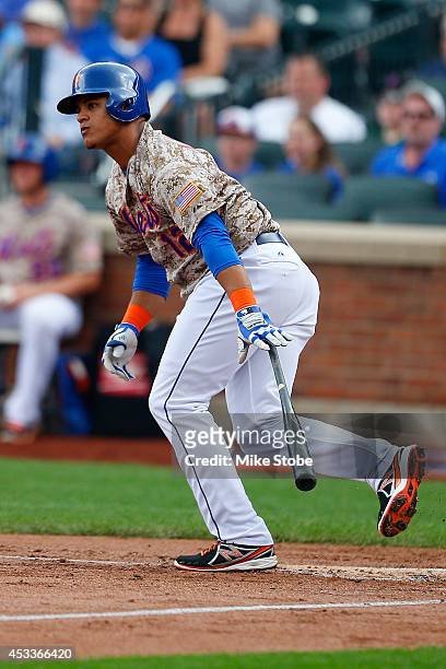 Juan Lagares of the New York Mets in action against the San Francisco Giants at Citi Field on August 4, 2014 in the Flushing neighborhood of the...