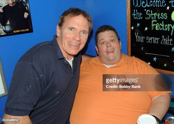 Vinnie Brand and Ralphie May backstage at The Stress Factory Comedy Club on August 8, 2014 in New Brunswick, New Jersey.