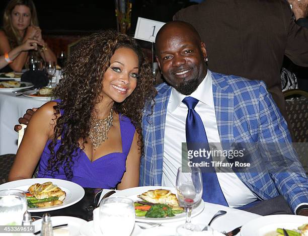 Patricia Southall and football player Emmitt Smith attend 14th Annual Harold & Carole Pump Foundation Event on August 8, 2014 in Los Angeles,...
