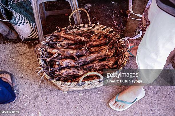 Roasted rats for sale at Langowan traditional market on August 9, 2014 in Langowan, North Sulawesi. The Langowan traditional market is famous for...