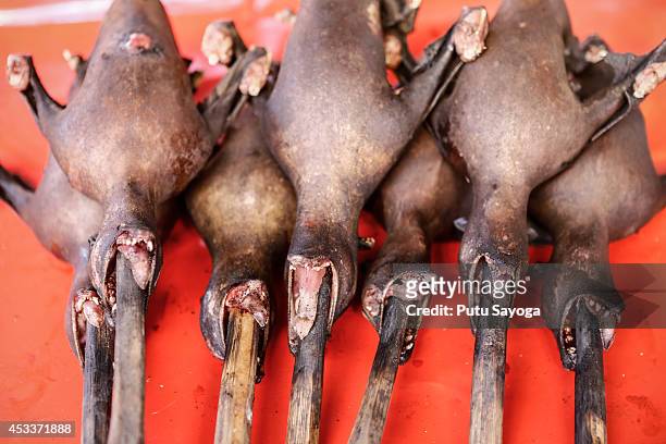 Roasted bats for sale at Langowan traditional market on August 9, 2014 in Langowan, North Sulawesi. The Langowan traditional market is famous for...
