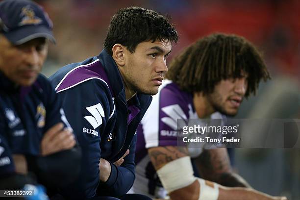 Jordan McLean of the Storm sits on the bench during the round 22 NRL match between the Newcastle Knights and the Melbourne Storm at Hunter Stadium on...