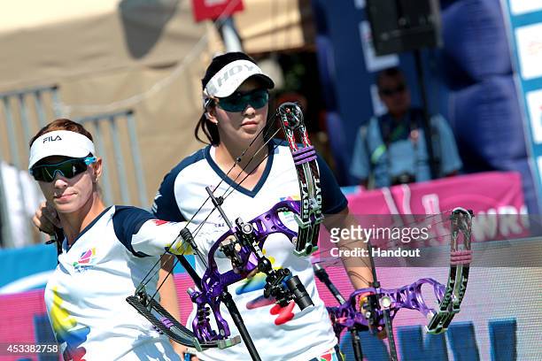 In this handout image provided by the World Archery Federation, Colombia in the compound womens team bronze final at the Archery World Cup 2014 Stage...