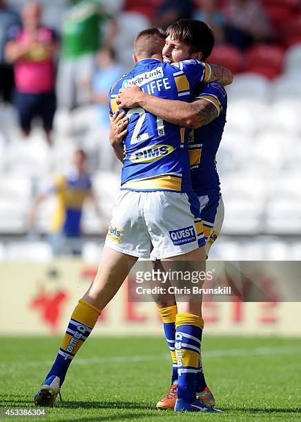 Tom Briscoe of Leeds Rhinos is is congratulated by team-mate Liam Sutcliffe after going over for a try during the Tetley's Challenge Cup Semi Final...
