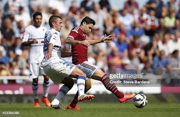 Mauro Zarate of West Ham United is tackled by Nenad Krsticic of Sampdoria during the pre-season friendly match between West Ham United and Sampdoria...