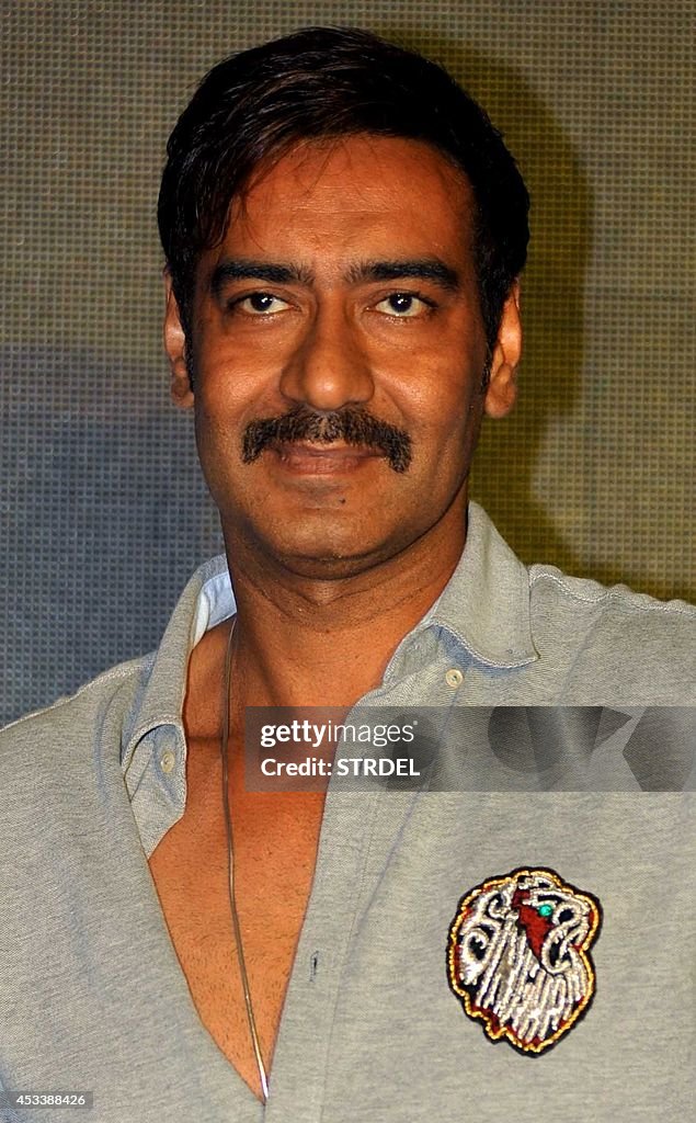 Ajay Indian Bollywood actor Ajay Devgn poses for a photograph during a ...