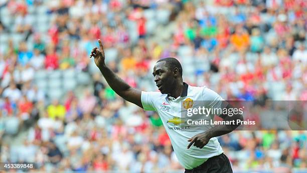 Andrew Cole of ManUtd Legends celebrates the opening goal during the friendly match between FC Bayern Muenchen AllStars and Manchester United Legends...