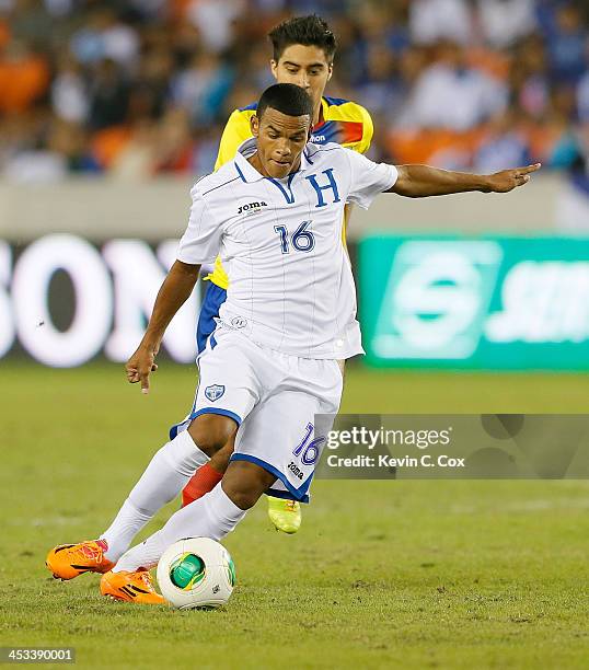 Rony Martínez of Honduras against Ecuador during an international friendly match at BBVA Compass Stadium on November 19, 2013 in Houston, Texas.