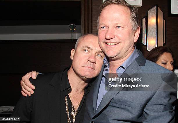 Artist Damien Hirst and Nick Jones at the Tracey Emin dinner hosted by Phillips and Vanity Fair at Cecconi's at Soho Beach House on December 3, 2013...