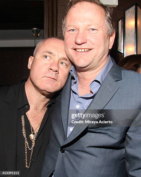 Artist Damien Hirst and Nick Jones at the Tracey Emin dinner hosted by Phillips and Vanity Fair at Cecconi's at Soho Beach House on December 3, 2013...