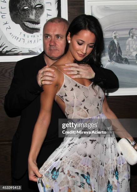 Artist Damien Hirst and Roxie Nafousi at the Tracey Emin dinner hosted by Phillips and Vanity Fair at Cecconi's at Soho Beach House on December 3,...