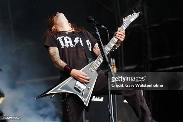 Alexi Laiho of Children of Bodom performs on stage at Bloodstock Open Air Festival at Catton Hall on August 9, 2014 in Derby, United Kingdom.